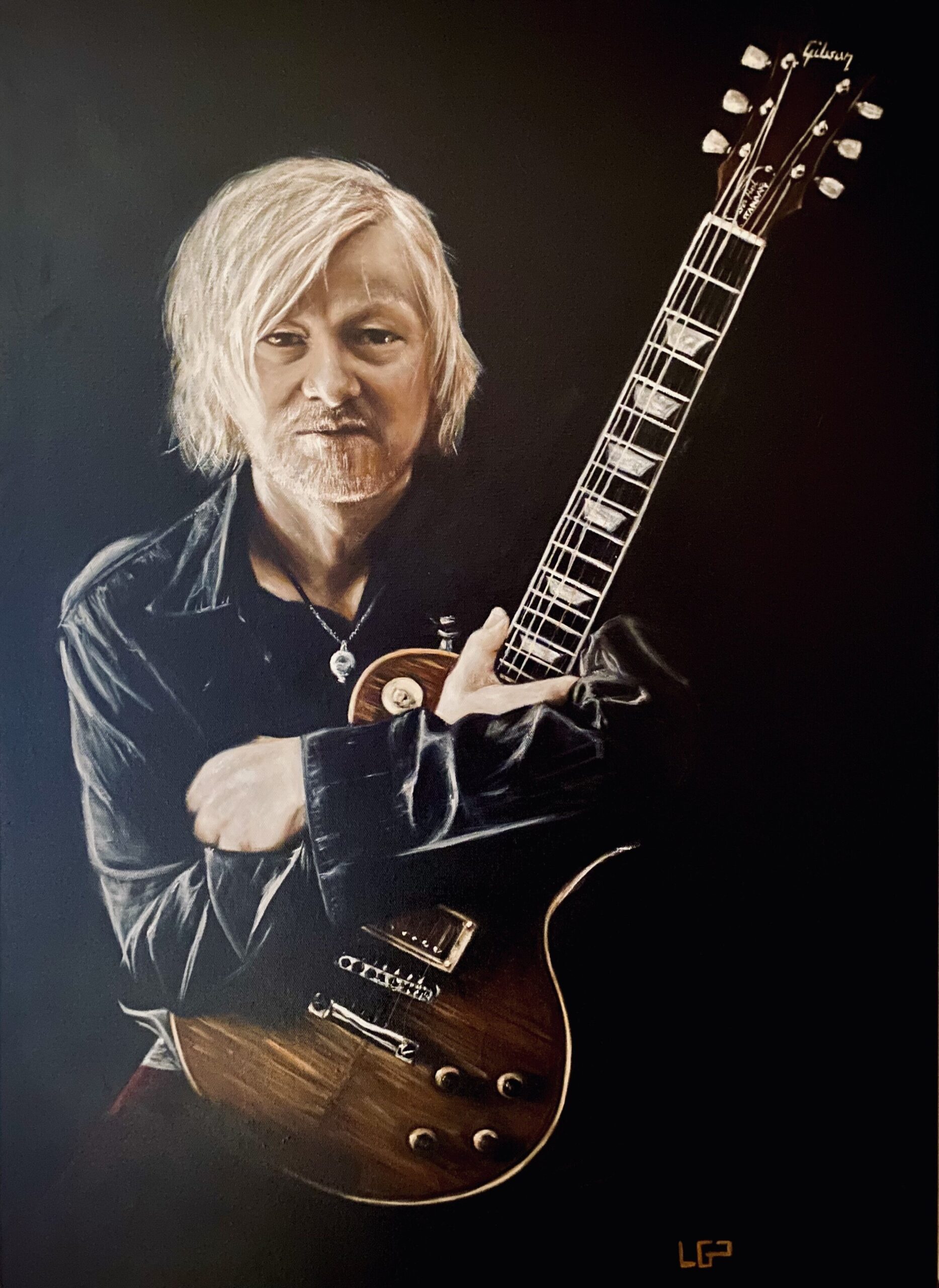 The Man Behind the Guitar